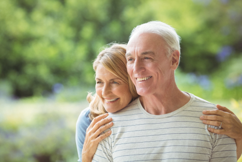 Smiling Middle-Aged Couple after Cataract Surgery