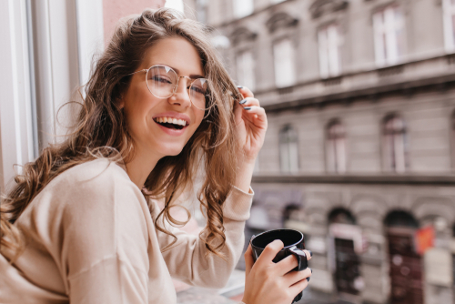 Smiling Young Woman Wearing Glasses