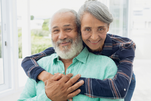 Older couple smiling after cataract surgery