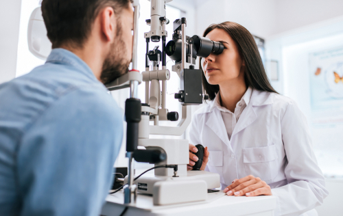 Eye Doctor performing an eye exam