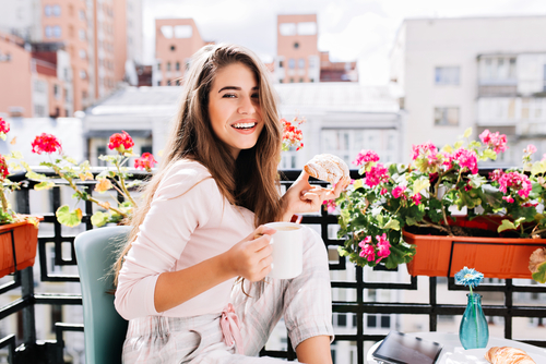 Young woman smiling after LASIK eye surgery