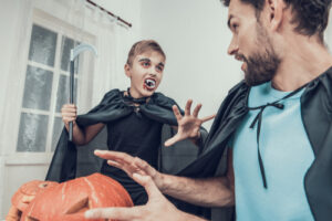 father and son celebrating halloween
