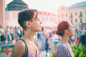 two women standing outside