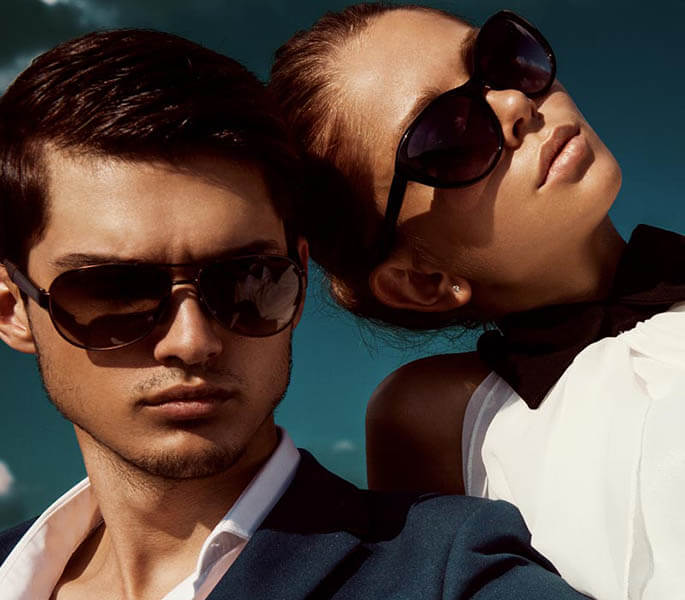 Woman and Man Wearing Sunglasses